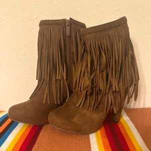 Women’s high heeled fringed Breckelles boots